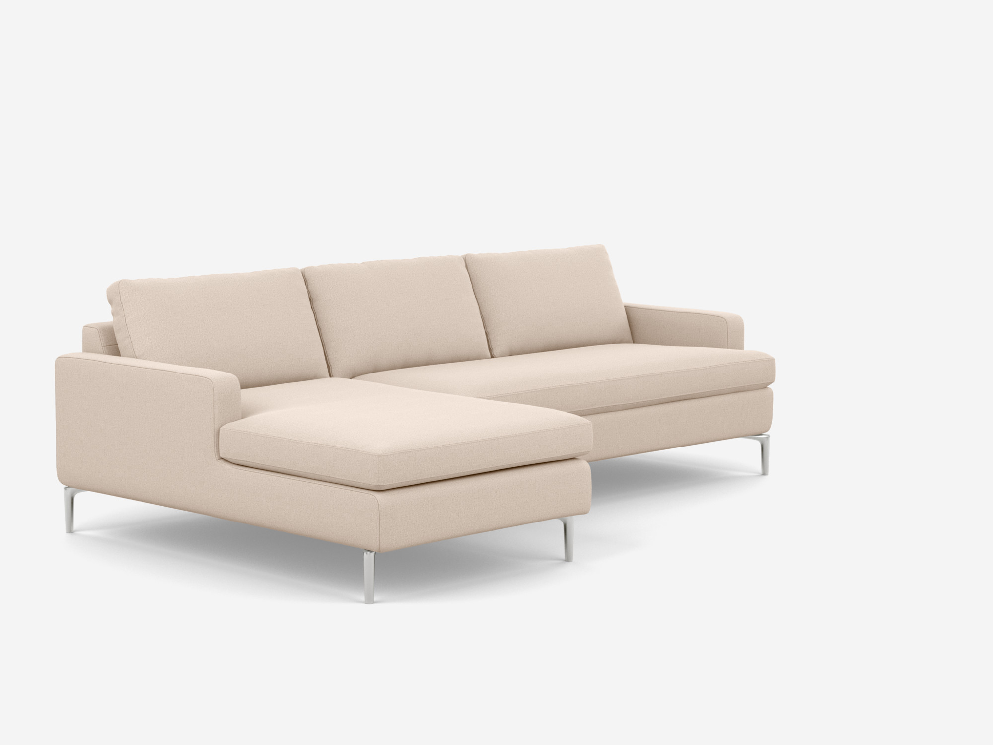 angle view of the Eve Grand modular sofa in white fabric with left hand chaise